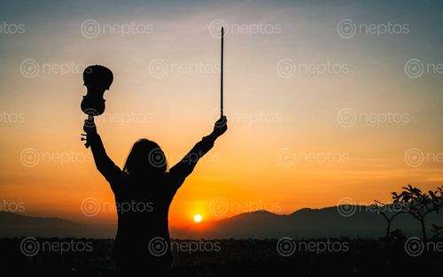 Find  the Image young,lady,enjoy,sunrise,kathmandu,nepal  and other Royalty Free Stock Images of Nepal in the Neptos collection.