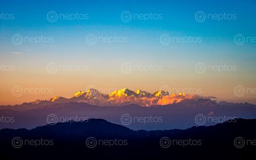 Find  the Image shining,mount,ganesh,range,view,kathmandu,nepal  and other Royalty Free Stock Images of Nepal in the Neptos collection.