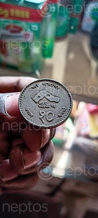 Find  the Image ancient,nepalese,coin,rupees,ten  and other Royalty Free Stock Images of Nepal in the Neptos collection.