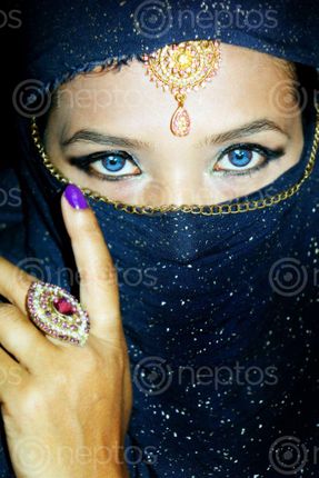 Find  the Image -portrait,beautiful,nepali,girl,hiding,face,dark,blue,niqab#,stock,image,#creativephotography#,nepal,photogrphy,sita,maya,shrestha  and other Royalty Free Stock Images of Nepal in the Neptos collection.