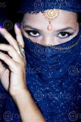 Find  the Image -portrait,beautiful,nepali,girl,hiding,face,dark,blue,niqab#,stock,image,#creativephotography#,nepal,photography,sita,maya,shrestha  and other Royalty Free Stock Images of Nepal in the Neptos collection.