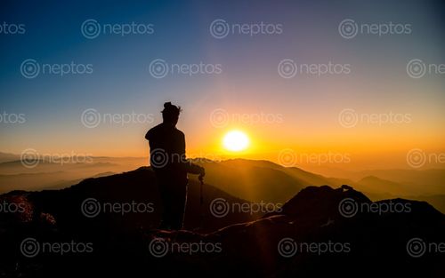 Find  the Image traveler,watching,beautiful,sunrise,bethanchok,hight,kavre,nepal  and other Royalty Free Stock Images of Nepal in the Neptos collection.