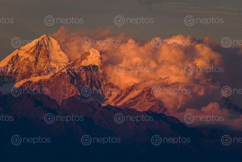 Find  the Image golden,sunset,ganesh,mountain  and other Royalty Free Stock Images of Nepal in the Neptos collection.
