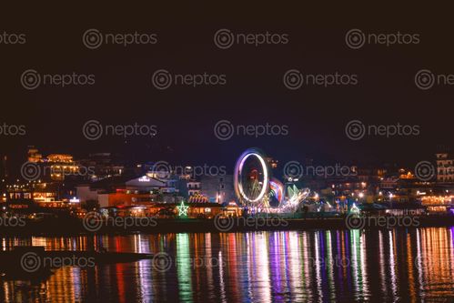 Find  the Image lakeside,pokhara,year's,eve  and other Royalty Free Stock Images of Nepal in the Neptos collection.
