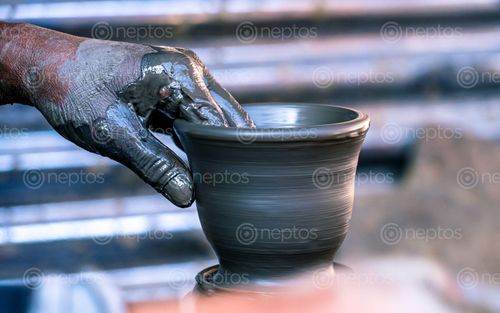 Find  the Image making,handmade,traditional,pottery,clay,pot,bhaktapur,nepal  and other Royalty Free Stock Images of Nepal in the Neptos collection.