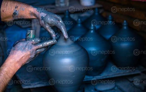 Find  the Image making,handmade,traditional,pottery,clay,pot  and other Royalty Free Stock Images of Nepal in the Neptos collection.