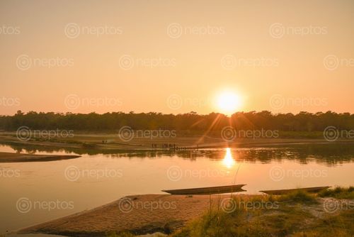 Find  the Image sunset,boat,river,chitwan,nepal  and other Royalty Free Stock Images of Nepal in the Neptos collection.