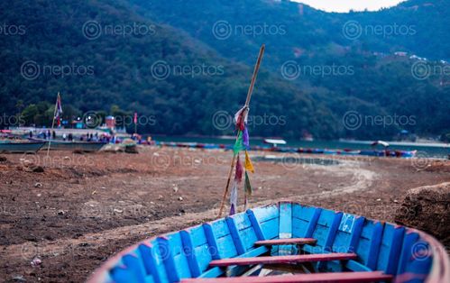 Find  the Image gloomy,day,fewa,lake  and other Royalty Free Stock Images of Nepal in the Neptos collection.