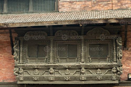 Find  the Image window,carving,patan,durbar,square,nepal,world,heritage,site,declared,unesco  and other Royalty Free Stock Images of Nepal in the Neptos collection.