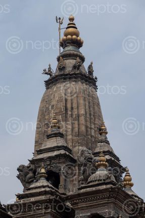 Find  the Image detailed,stone,carving,atop,krishna,mandirkrishna,temple,patan,durbar,square,nepal  and other Royalty Free Stock Images of Nepal in the Neptos collection.